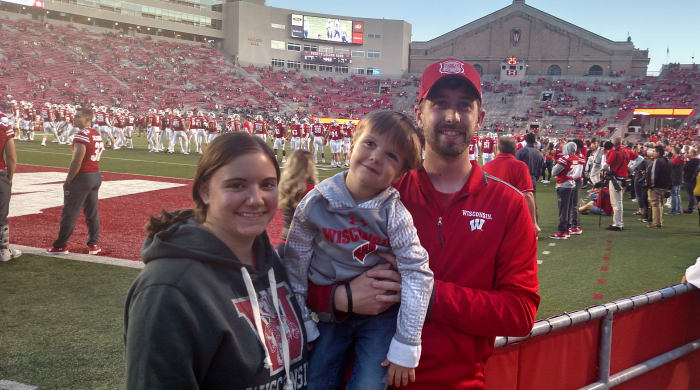 DeValk grew up as a diehard Badgers fan, but he and his wife (pictured here with their son) picked up Wake Forest as their local team to root for in North Carolina.